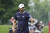 Adam Hadwin acknowledges the crowd after his par putt to tie Collin Morikawa and Rickie Fowler for a playoff during the final round of the Rocket Mortgage Classic golf tournament at Detroit Country Club, Sunday, July 2, 2023, in Detroit. Hadwin tied for second at the Classic, losing to eventual champion Fowler. THE CANADIAN PRESS/AP-Carlos Osorio