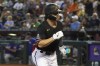 Arizona Diamondbacks' Corbin Carroll pumps his fist after a home run against the New York Mets during the first inning of a baseball game Tuesday, July 4, 2023, in Phoenix. (AP Photo/Darryl Webb)