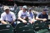 Seattle-area friends Dick Weaver, from left, Ray Cross, Steve Yost and Keith Beach sit in the stands before a baseball game between the Seattle Mariners and the San Francisco Giants, Tuesday, July 4, 2023, in San Francisco. (AP Photo/D. Ross Cameron)