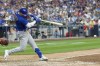 Chicago Cubs' Nico Hoerner hits an RBI single during the 11th inning of a baseball game against the Milwaukee Brewers Tuesday, July 4, 2023, in Milwaukee. (AP Photo/Morry Gash)