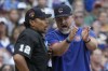 Chicago Cubs manager David Ross aregues with home plate umpire Gerry Davis during the sixth inning of a baseball game against the Milwaukee Brewers Tuesday, July 4, 2023, in Milwaukee. (AP Photo/Morry Gash)