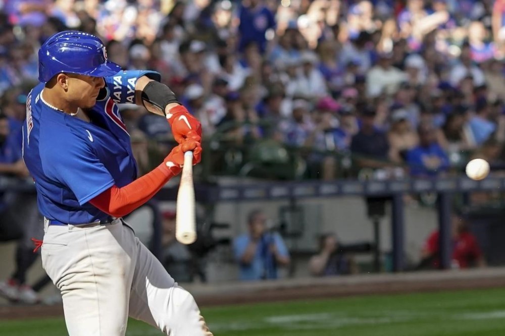 Chicago Cubs' Miguel Amaya hits a two-run scoring double during the eighth inning of a baseball game against the Milwaukee Brewers Tuesday, July 4, 2023, in Milwaukee. (AP Photo/Morry Gash)