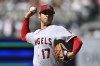 Los Angeles Angels starting pitcher Shohei Ohtani (17) delivers during the first inning of the team's baseball game against the San Diego Padres on Tuesday, July 4, 2023, in San Diego. (AP Photo/Denis Poroy)