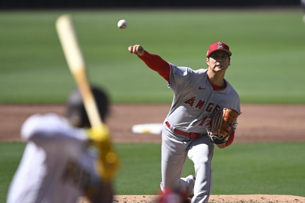 Los Angeles Angels starting pitcher Shohei Ohtani delivers during the second inning of the team's baseball game against the San Diego Padres on Tuesday, July 4, 2023, in San Diego. (AP Photo/Denis Poroy)