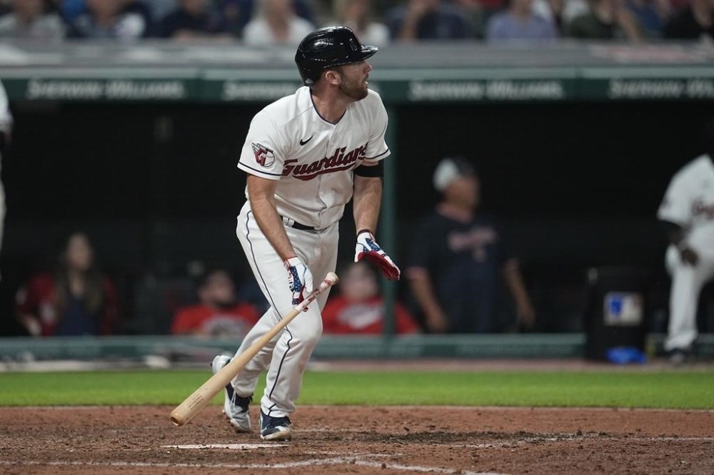 Cleveland Guardians' David Fry watches his game-winning single in the tenth inning of a baseball game against the Atlanta Braves, Tuesday, July 4, 2023, in Cleveland. (AP Photo/Sue Ogrocki)