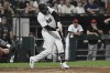 Chicago White Sox's Luis Robert Jr. hits a three-run home run against the Toronto Blue Jays during the sixth inning of a baseball game Tuesday, July 4, 2023, in Chicago. (AP Photo/Matt Marton)