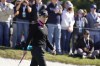 FILE - Morgan Pressel reads a green on The Hay short course during the celebrity challenge event of the AT&T Pebble Beach Pro-Am golf tournament in Pebble Beach, Calif., Feb. 2, 2022. Pressel considered extending her playing career so that she would have the opportunity to play in this week's U.S. Women's Open at Pebble Beach. Pressel is going into her third Women's Open as NBC's analyst. (AP Photo/Eric Risberg, File)