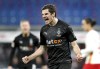 FILE -Moenchengladbach's Jonas Hofmann celebrates after scoring the opening goal by penalty during the German Bundesliga soccer match between RB Leipzig and Borussia Moenchengladbach in Leipzig, Germany, Saturday, Feb. 27, 2021. Bayer Leverkusen has signed Germany forward Jonas Hofmann from Bundesliga rival Borussia Mönchengladbach. Leverkusen says Hofmann signed a deal through June 2027. (AP Photo/Michael Sohn, File)