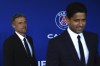 Newly named PSG coach Luis Enrique, left, follows PSG president Nasser Al-Khelaifi at the new Paris-Saint-Germain training ground Wednesday, July 5, 2023 in Poissy, west of Paris. Paris Saint-Germain fired coach Christophe Galtier after a disappointing season on and replaced him with former Spain and Barcelona manager Luis Enrique. (AP Photo/Aurelien Morissard)