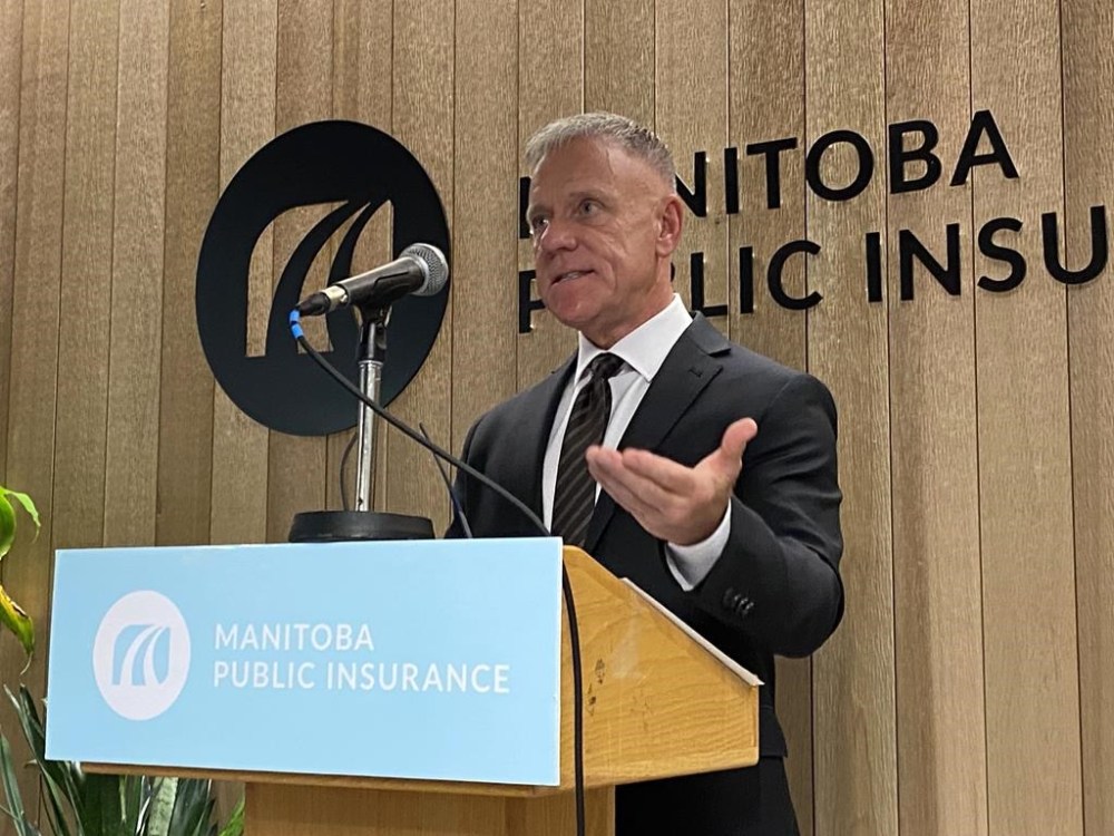 Ward Keith, board chair of Manitoba Public Insurance, speaks to reporters Tuesday, June 6, 2023. A senior executive at a Manitoba Crown corporation was sometimes being reimbursed for travel to Winnipeg from his home in the Toronto area twice a month, figures obtained by The Canadian Press show. THE CANADIAN PRESS/Steve Lambert