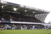 FILE - Millwall and Crystal Palace players challenge for the ball during the English FA Cup third round soccer match between Millwall and Crystal Palace at The Den stadium in London, England, Saturday, Jan. 8, 2022. John Berylson, the American businessman, owner and chairman of English soccer team Millwall, has died. He was 70. His death was announced by the second-division team, which said he had “lost his life in a tragic accident