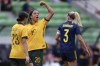 FILE - Australia's Sam Kerr, center, celebrates scoring as Sweden's Linda Sembrant, right, walks past during their women's friendly soccer match in Melbourne, Australia, Saturday, Nov. 12, 2022. (Asanka Brendon Ratnayake, File)