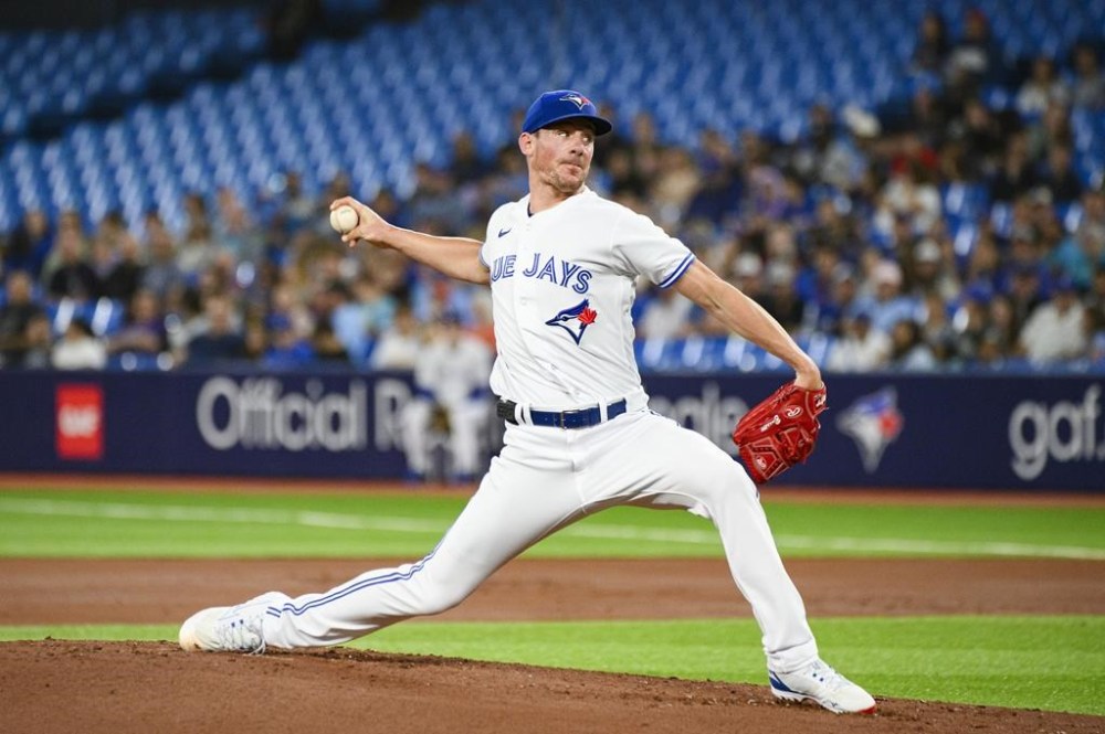 Toronto Blue Jays starting pitcher Chris Bassitt (40) throws during first inning AL MLB baseball action against the Oakland Athletics, in Toronto on Friday, June 23, 2023. Toronto is one of eight MLB teams that forfeited its second-round pick after signing a qualified free agent in the off-season. In the Jays' case, it was the decision to sign Bassitt to a three-year deal after he'd received a qualifying offer from the New York Mets that led to losing the pick. THE CANADIAN PRESS/Christopher Katsarov