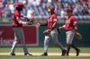Cincinnati Reds' Elly De La Cruz, from left, Jonathan India and Matt McLain celebrate after a baseball game against the Washington Nationals, Tuesday, July 4, 2023, in Washington. Cincinnati won 8-4. (AP Photo/Patrick Semansky)