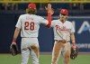 Philadelphia Phillies' Alec Bohm (28) and Bryson Stott celebrate an 8-4 win over the Tampa Bay Rays during a baseball game Wednesday, July 5, 2023, in St. Petersburg, Fla. (AP Photo/Steve Nesius)