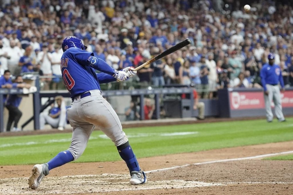 Chicago Cubs' Mike Tauchman hits a two-run scoring double during the ninth inning of a baseball game against the Milwaukee Brewers Wednesday, July 5, 2023, in Milwaukee. (AP Photo/Morry Gash)