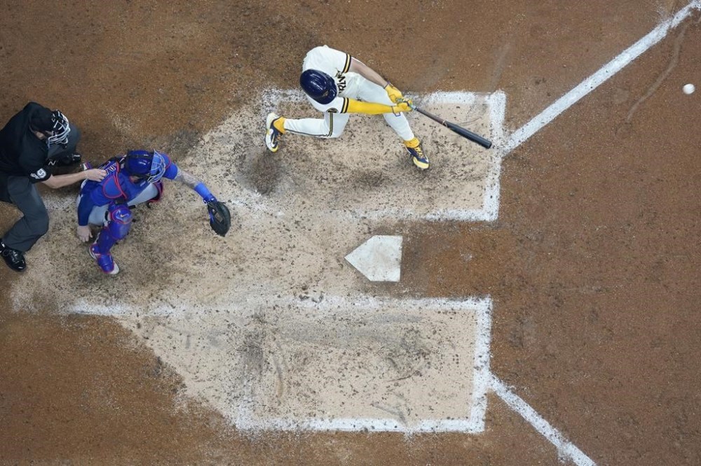Milwaukee Brewers' Willy Adames hits a home run during the sixth inning of a baseball game against the Chicago Cubs Wednesday, July 5, 2023, in Milwaukee. (AP Photo/Morry Gash)
