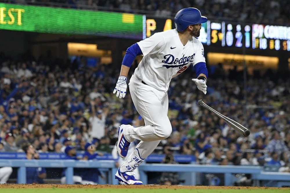 Los Angeles Dodgers' J.D. Martinez heads to first after hitting a three-run home run during the fifth inning of a baseball game against the Pittsburgh Pirates Wednesday, July 5, 2023, in Los Angeles. (AP Photo/Mark J. Terrill)