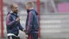 FILE - Bayern head coach Pep Guardiola of Spain, left talks to Bastian Schweinsteiger during a training session prior to the Champions League group D soccer match between FC Bayern Munich and CSKA Moscow, in Munich, Germany, Monday, Sept. 16, 2013. Former Germany winger Bastian Schweinsteiger says Pep Guardiola shares blame for the national team’s decline. He tells British radio station Talksport that Germany lost its values because of the Spanish coach. (AP Photo/Matthias Schrader, File)