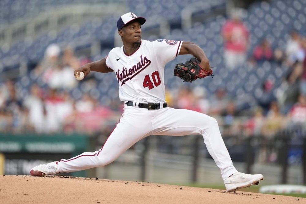 Washington Nationals starting pitcher Josiah Gray throws to the Cincinnati Reds in the first inning of a baseball game, Wednesday, July 5, 2023, in Washington. (AP Photo/Patrick Semansky)
