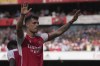 FILE - Arsenal's Granit Xhaka celebrates after scoring his side's opening goal during the English Premier League soccer match between Arsenal and Wolverhampton Wanderers at the Emirates Stadium in London, Sunday, May 28, 2023. Bayer Leverkusen has brought Switzerland midfielder Granit Xhaka back to the Bundesliga from Premier League side Arsenal. Leverkusen says the 30-year-old Xhaka signed a contract through June 2028. (AP Photo/Kin Cheung, File)