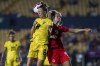 Jamaica's Havana Solaun, left, and Canada's Jordyn Huitema fight for the ball during a CONCACAF Women's Championship soccer semifinal match in Monterrey, Mexico, Thursday, July 14, 2022. The Canadian women's soccer team will face Jamaica in a two-game series in September with a spot in the 2024 Paris Olympics.THE CANADIAN PRESS/AP/Fernando Llano