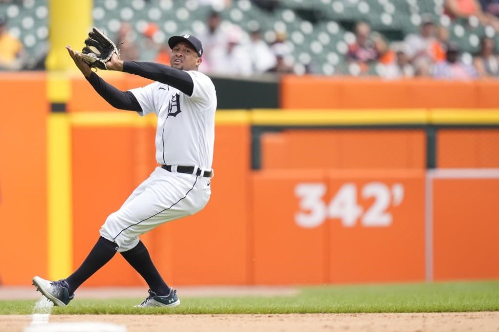 Detroit Tigers third baseman Jonathan Schoop controls the single hit by Oakland Athletics' Jordan Diaz during the fifth inning of a baseball game, Thursday, July 6, 2023, in Detroit. (AP Photo/Carlos Osorio)