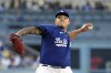 Los Angeles Dodgers starting pitcher Julio Urias throws to the plate during the first inning of a baseball game against the Pittsburgh Pirates Thursday, July 6, 2023, in Los Angeles. (AP Photo/Mark J. Terrill)
