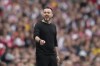 FILE - Brighton's head coach Roberto De Zerbi gives instructions during the English Premier League soccer match between Arsenal and Brighton and Hove Albion at Emirates stadium in London, Sunday, May 14, 2023. Under threat of losing European competition places, Brighton, Toulouse and Aston Villa were cleared Friday, July 7, 2023, by UEFA to play next season despite their owners having ties to other clubs that qualified, including AC Milan, but all had limits placed on future transfer dealings with their sibling teams. (AP Photo/Kirsty Wigglesworth, File)
