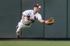 St. Louis Cardinals center fielder Tommy Edman dives to catch a fly ball by Houston Astros' Yainer Diaz to end the top of the fourth inning of a baseball game Thursday, June 29, 2023, in St. Louis. (AP Photo/Jeff Roberson)