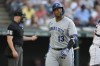 Kansas City Royals' Salvador Perez (13) walks back to the dugout after striking out during the fourth inning of the team's baseball game against the Cleveland Guardians, Friday, July 7, 2023, in Cleveland. (AP Photo/Sue Ogrocki)