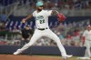 Miami Marlins starting pitcher Sandy Alcantara (22) aims a pitch during the first inning of a baseball game against the Philadelphia Phillies, Friday, July 7, 2023, in Miami. (AP Photo/Marta Lavandier)