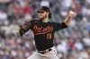 Baltimore Orioles starting pitcher Cole Irvin throws to a Minnesota Twins batter during the first inning of a baseball game Friday, July 7, 2023, in Minneapolis. (AP Photo/Stacy Bengs)