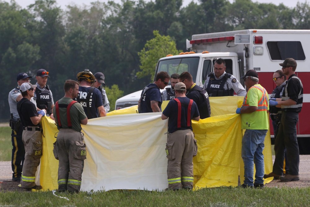 Matthew Salyn knows nearly all of the first responders who were in this photo of the crash site. (Matt Goerzen / The Brandon Sun)