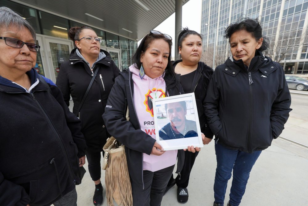 RUTH BONNEVILLE / WINNIPEG FREE PRESS FILESAnthony Sinclair's family outside the Law Courts building.
