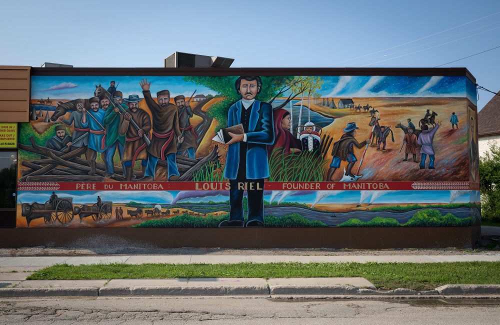 JESSICA LEE / WINNIPEG FREE PRESS
The newly restored mural of Louis Riel at Pembina Highway and Eglise Avenue was unveiled Wednesday.
