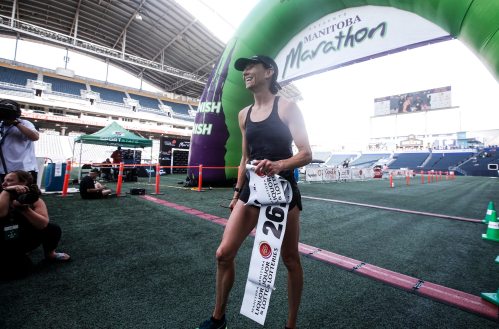 JOHN WOODS / WINNIPEG FREE PRESS
Dawn Neal celebrates winning the 45th Manitoba Marathon in Winnipeg, Sunday, June 18, 2023.