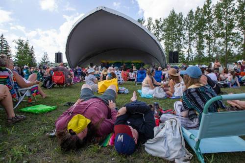 Daniel Crump / Winnipeg Free Press
                                People listen to music during at the 47 annual Winnipeg Folk Festival at Birds Hill Provincial Park in July last year.