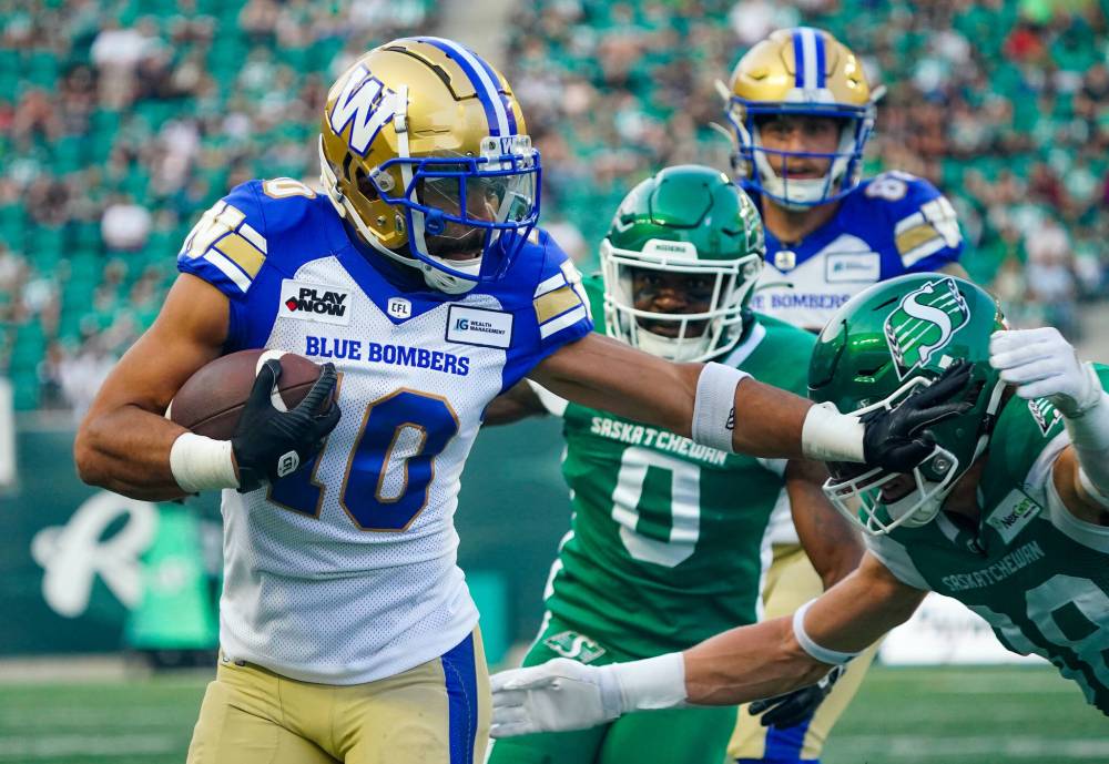 Heywood Yu / THE CANADIAN PRESS files
As Nic Demski (left) and his fiancee, Vanessa, have welcomed their daughter to the world, the Bombers’ receiver has been turning to teammates such as Willie Jefferson for advice on being a father.