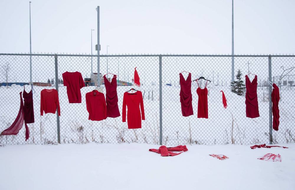JESSICA LEE / WINNIPEG FREE PRESS
Red dresses hang at Brady Road landfill where the remains of Rebecca Contois were found.