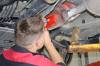 JORDAN ROSS / THE CARILLON
                                Harvest Honda mechanic Jerry Mitchell engraves a catalytic converter using one of 50 tool kits purchased by the province for garages in the Steinbach area.