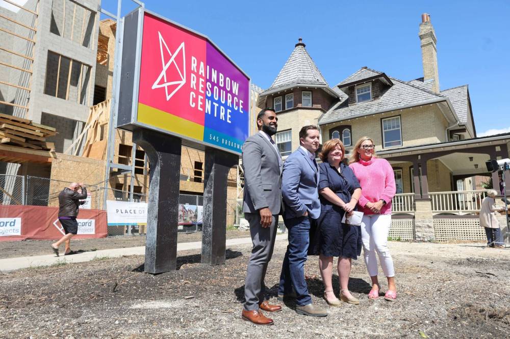 RUTH BONNEVILLE / WINNIPEG FREE PRESS
From left: Sport Minister Obby Khan, Rainbow Resource Centre chair Matthew Cutler, Westminster Housing Society chair Mary Agnes Welch, and Families Minister Rochelle Squires.