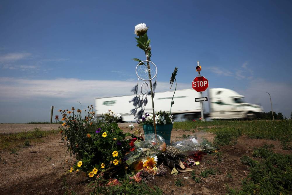 Flowers and other items placed at the intersection of the Trans Canada Highway and Highway 5 just north of Carberry as a memorial to the victims of a devastating collision earlier in June involving a semi trailer and a passenger bus. (Tim Smith / The Brandon Sun files)