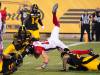 Ottawa Redblacks quarterback Dustin Crum (18) is tackled short of the end zone by Hamilton Tiger-Cats defenders on the last play of CFL football game action in Hamilton, Ont. on July 8. (Peter Power / The Canadian Press)