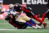 JUSTIN TANG / THE CANADIAN PRESS
                                Winnipeg Blue Bombers wide receiver Drew Wolitarsky (82) is tackled by Ottawa Redblacks defensive back Damon Webb (6) and defensive back Brandin Dandridge (37) during first half CFL football action in Ottawa on Saturday, July 15, 2023.