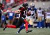JUSTIN TANG / THE CANADIAN PRESS FILES
                                Ottawa Redblacks quarterback Dustin Crum (18) runs his way to a game winning touchdown past Winnipeg Blue Bombers linebacker Jesse Briggs (34) during overtime CFL football action in Ottawa on Saturday.