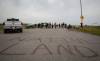 JESSICA LEE / WINNIPEG FREE PRESS
                                Ethan Boyer Way reopened to the public at about 1:15 p.m. Protesters had blocked the road to the city-run landfill since July 6.