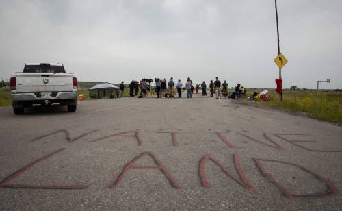 JESSICA LEE / WINNIPEG FREE PRESS
                                Ethan Boyer Way reopened to the public at about 1:15 p.m. Protesters had blocked the road to the city-run landfill since July 6.