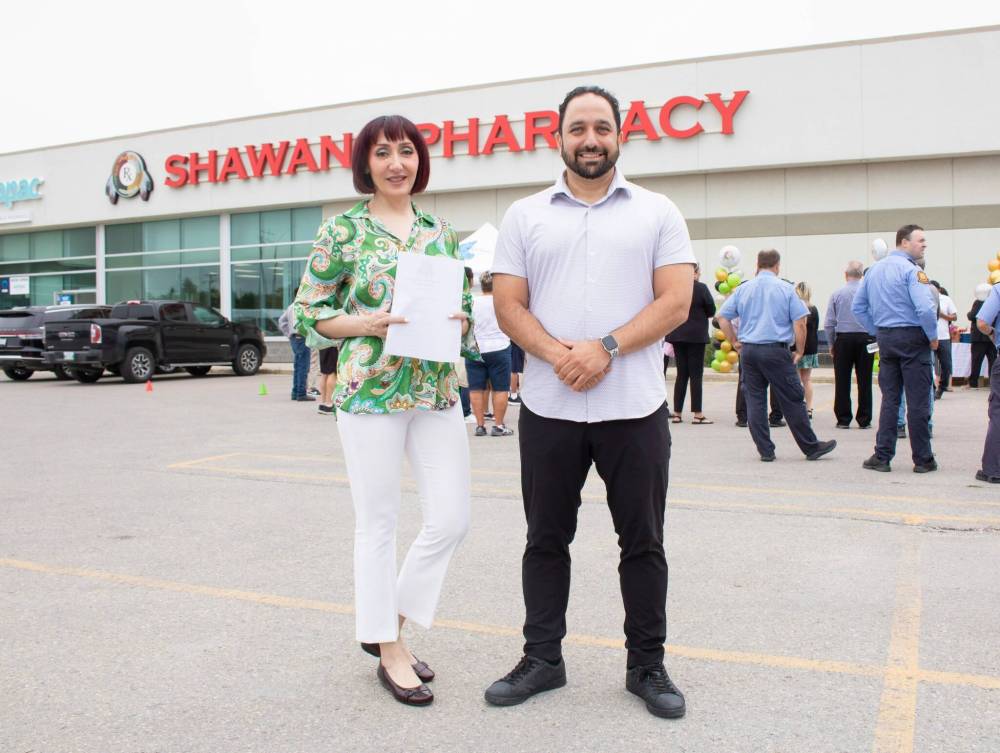 MIKE THIESSEN / WINNIPEG FREE PRESS
                                Somlaz Nafez (left), pharmacy manager at Shawano Pharmacy, and Ali Reyhany, owner of Care Pharmacies. Pharmacy profits flow into expanding the business, and back to the First Nations founders. Communities that use Shawano’s services get a rebate, Reyhany says