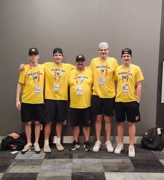 Richard De La Ronde (centre) is coaching three of his sons at the North American Indigenous Games while the fourth is playing on Manitoba's under-16 team. (Supplied)
